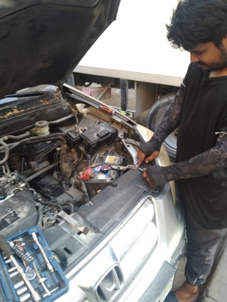 Old car battery testing and new battery replacement